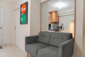 Elegant and Comfy 2BR above Mall at Bassura City Apartment By Travelio