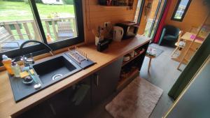 Maisons de vacances Tiny somniflore : photos des chambres