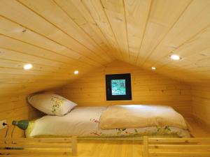 Maisons de vacances Tiny somniflore : photos des chambres