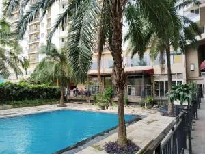 Amerta Room Apartemen Mutiara Powered by Cocotel - Rawapanjang