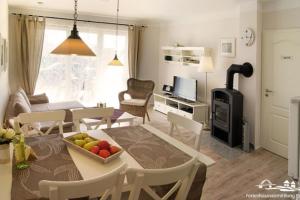 35 Ferienwohnung an der Reiterkoppel 45b EG