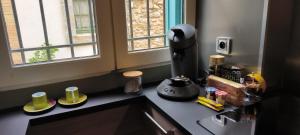 Appartements Appartement sous les remparts : photos des chambres