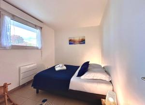 Le 14, 4 pers, 2 chambres, clim, proche autoroute