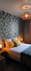 Appartements Appartement sous les remparts : photos des chambres