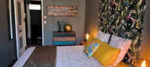 Appartements Appartement sous les remparts : photos des chambres