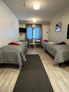 Quadruple Room with Shared Bathroom room in Outdoor Hostel Laajis