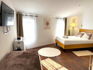 Appartements Residence La Ruelle Secrete - 5 studios - : photos des chambres