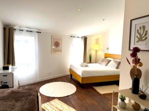 Appartements Residence La Ruelle Secrete - 5 studios - : photos des chambres