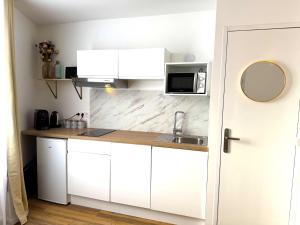 Appartements Residence La Ruelle Secrete - 5 studios - : photos des chambres