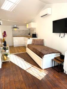 Appartements Residence La Ruelle Secrete - 5 studios - : photos des chambres