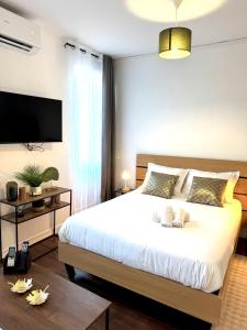 Appartements Residence La Ruelle Secrete - 5 studios - : photos des chambres