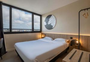 Hotels B&B HOTEL La Rochelle Centre Les Minimes : photos des chambres