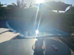 Cosy, private guest house with pool and private parking