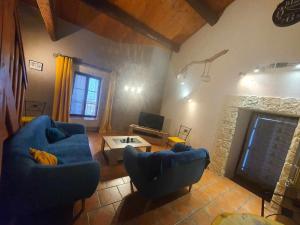 Appartements maison de village : photos des chambres