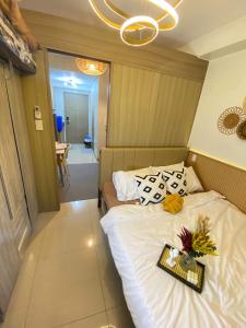 Aesthetic walking distance to MOA,near NAIA AIRPORT with NETFLIX,MINIVIDEOKE,BOARDGAMES-DUXE2