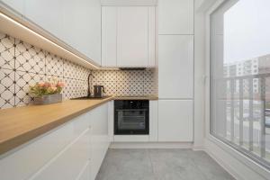 Przytulny Apartament z Tarasem & Balkonem by Noclegi Renters