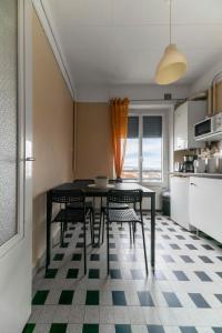 Appartements Le Victoria - Appartement coeur de ville avec vue : photos des chambres