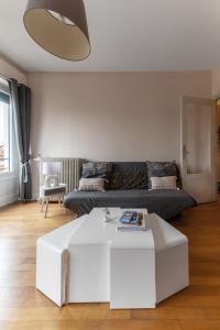 Appartements Le Victoria - Appartement coeur de ville avec vue : photos des chambres