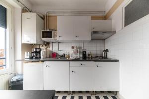 Appartements Le Victoria - Appartement coeur de ville avec vue : photos des chambres