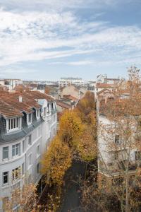 Appartements Le Victoria - Appartement coeur de ville avec vue : photos des chambres