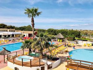 Maisons de vacances Bungalow spacieux avec piscine a Lattes : photos des chambres