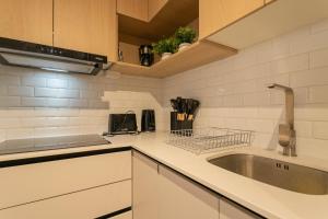 Elegant 2BR Experience Las Condes in Style