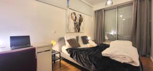 Appartements EXPO - Paris Porte de Versailles Parc des Expo a 5min avec parking : photos des chambres