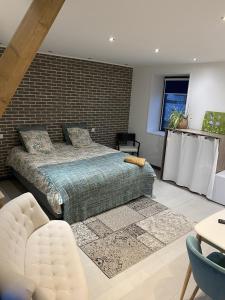 Maisons d'hotes Aux Herbes Hautes : photos des chambres