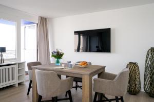 Ferienwohnung Sylter Welle mit kleinem Meerblick