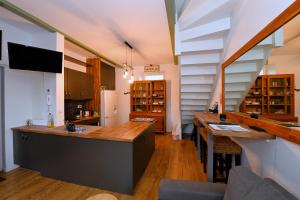 Appartements Les Petits Loups - Acces parc - Stationnement gratuit : photos des chambres