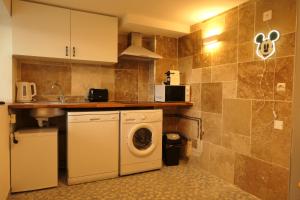 Appartements Appartement familial au bord de la Marne, jardin tropical , piscine, tennis, terrasse, parking gratuit proche Disneyland : photos des chambres