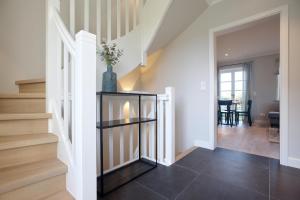 Ferienhaus Litj Horsa Hoog - Luxus, Lage, Leichtigkeit mit Wellenrauschen in Wenningstedt Sylt