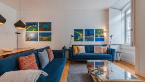 Downtown by the River Apartment by LovelyStay