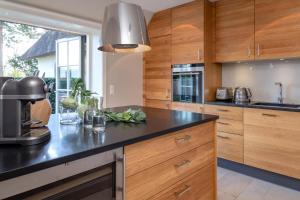 Ferienhaus Friesenhof Aenne Haus 3 - modern urlauben unter Reet in Keitum Sylt