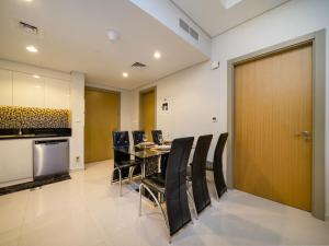 50th Floor 2 Bed with Burj and Sea view