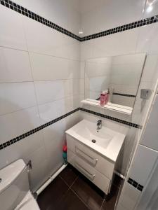 Appartements Renovated Gem 15 mins train to Paris : photos des chambres