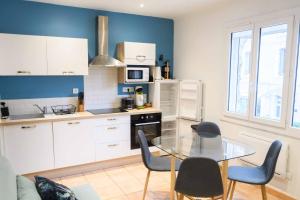 Appartements Les volets blancs : photos des chambres