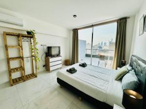 Estudio con terraza y vistas a la ciudad