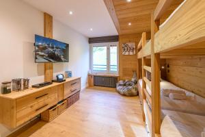 Appartements NEW Le Wapiti Prestige, Proche Pistes, Piscine et Centre du Village by LLA SELECTIONS : photos des chambres