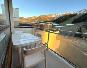 Appartements Appartement au pied des pistes avec terrasse : photos des chambres