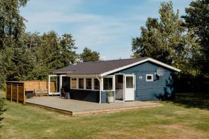 Blue Home With Room For Fun And Comfort