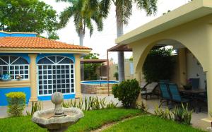 Cozy Mrida Retreat with Pool Garden View