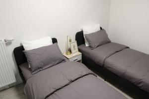 Appartements Cozy Luxe Villiers 10 minutes de paris - Proche Disneyland : photos des chambres