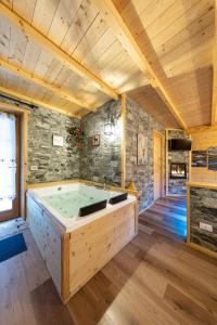 AL RANCH Cadore Wellness Dolomiti Apartments vicino Cortina Olimpiadi 2026 e Misurina Tre Cime Lavaredo