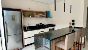 Jacuzzi e Piscina CASA Beto Carrero 4Q 3BWC a 300m do Parque Proximo a Praia churrasqueira e estacionamento privado