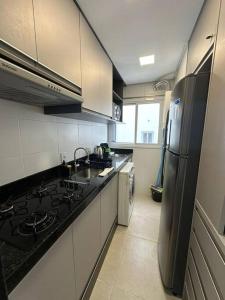 1 Dormitório, 50 metros do mar