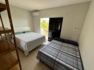 Casa Duplex em condomínio na Praia de Taperapuam - acomoda 7 hóspedes