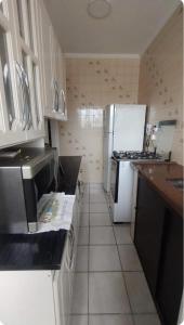 Apartamento na Guilhermina, beira - mar!