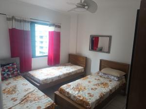 Apartamento na Guilhermina, beira - mar!