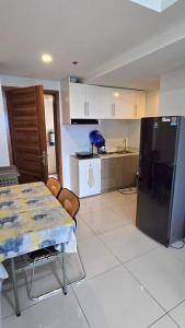 1BR T2 with Balcony Panoramic View at Horizons 101